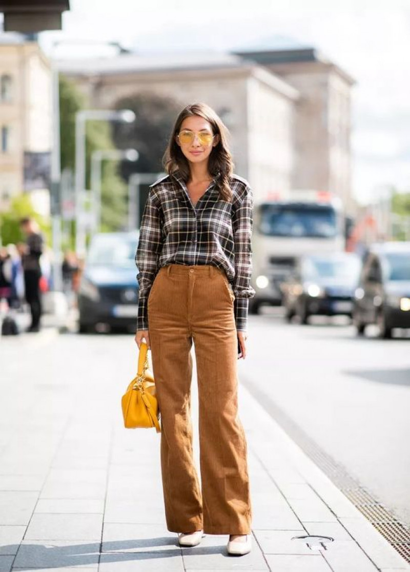 flannel with brown pants, luggage and bags, bell-bottoms