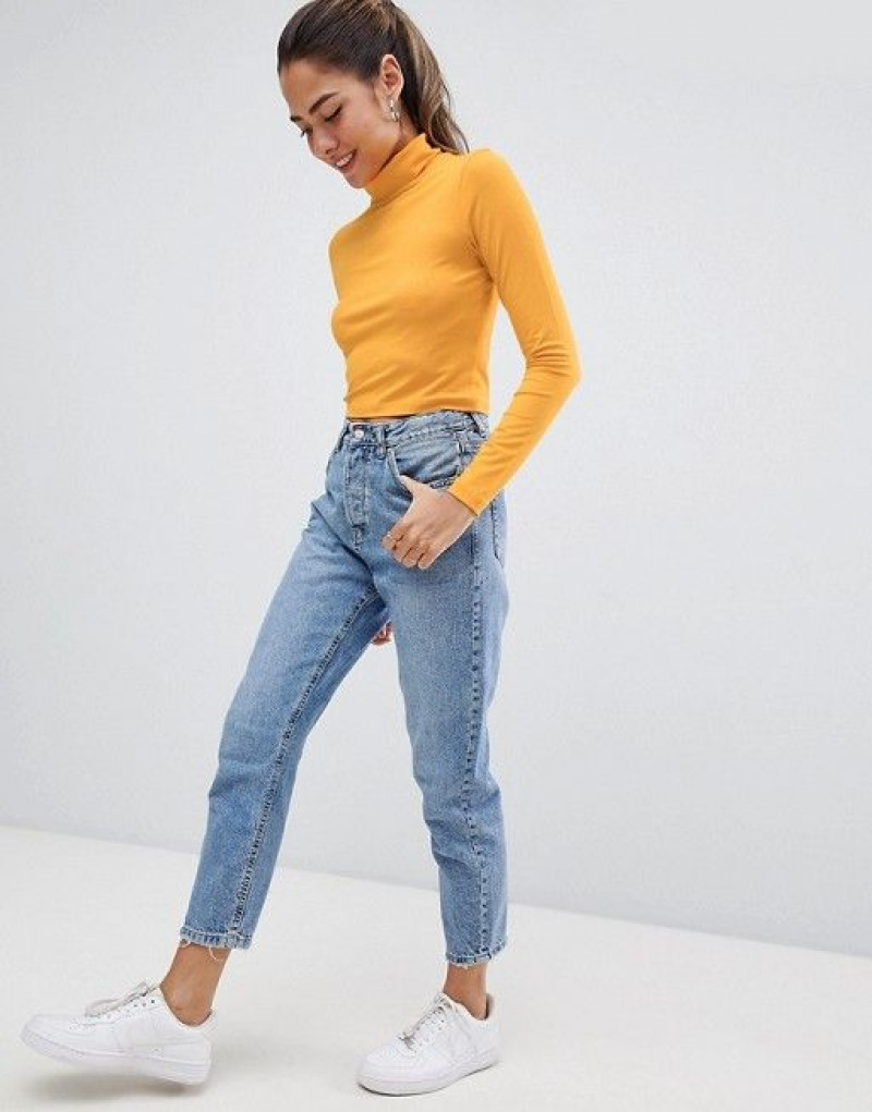 light blue casual trouser, yellow crop top, white sneaker