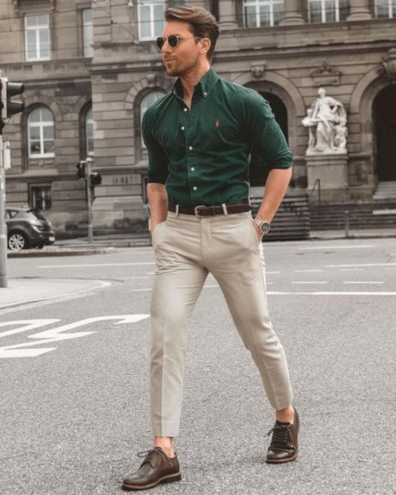 forest-green shirt and soft beige pants