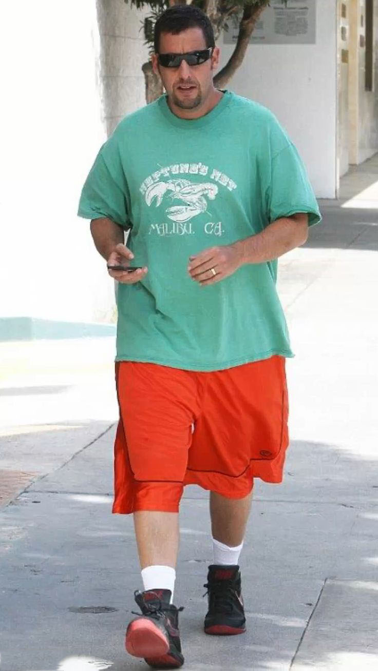 Green Graphic Tee with Orange Shorts